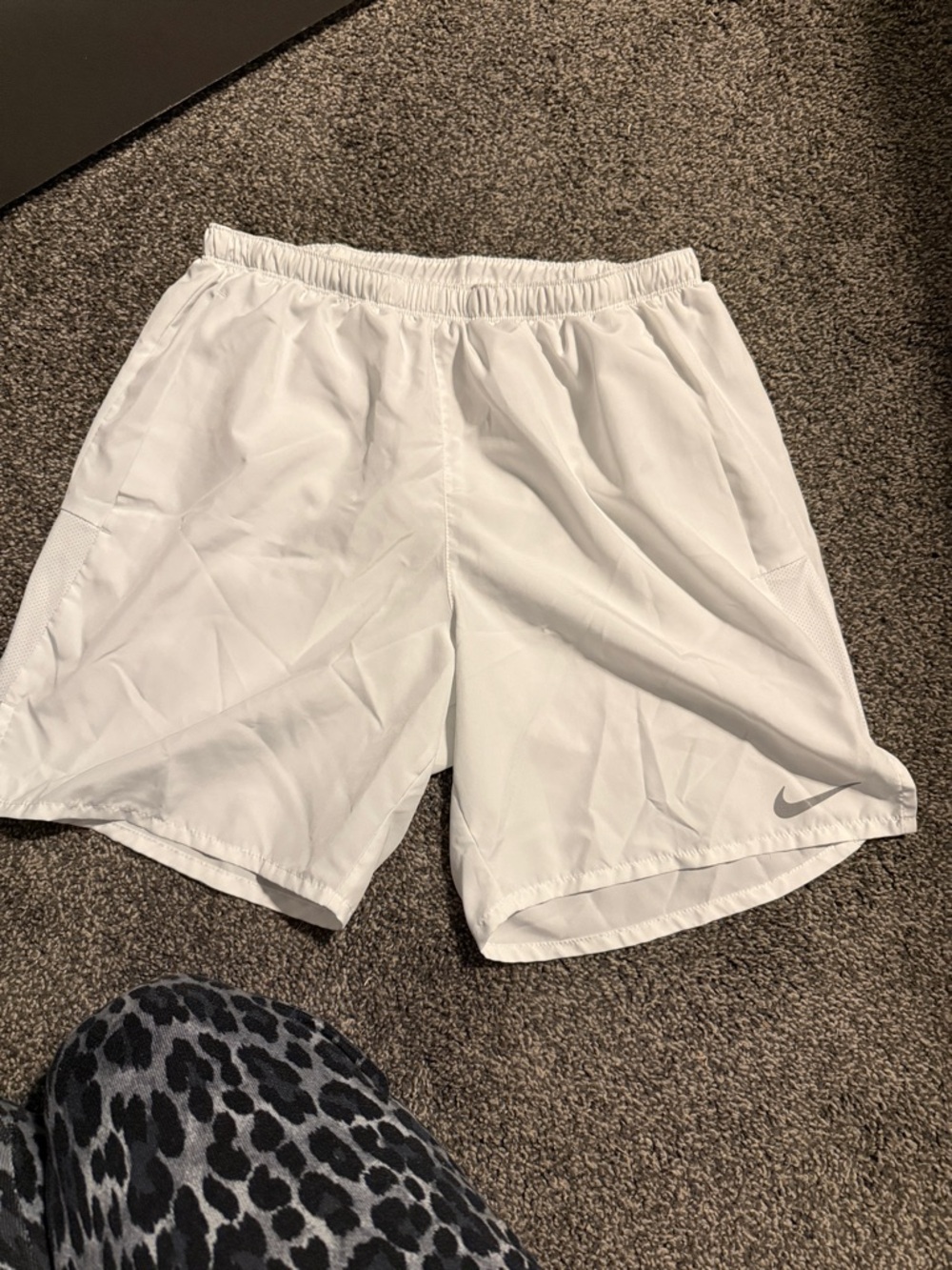 Nike Men’s White Athletic Shorts with Silver Swoosh
